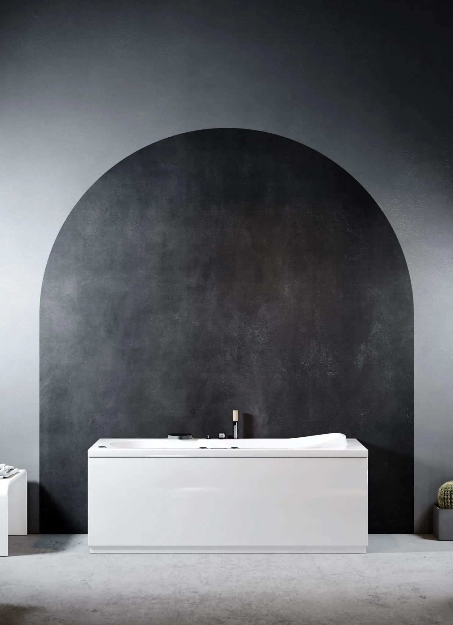 Vasca idromassaggio freestanding Collezione Sonia con fondo liscio e bordo sottile davanti a parete scura ad arco.