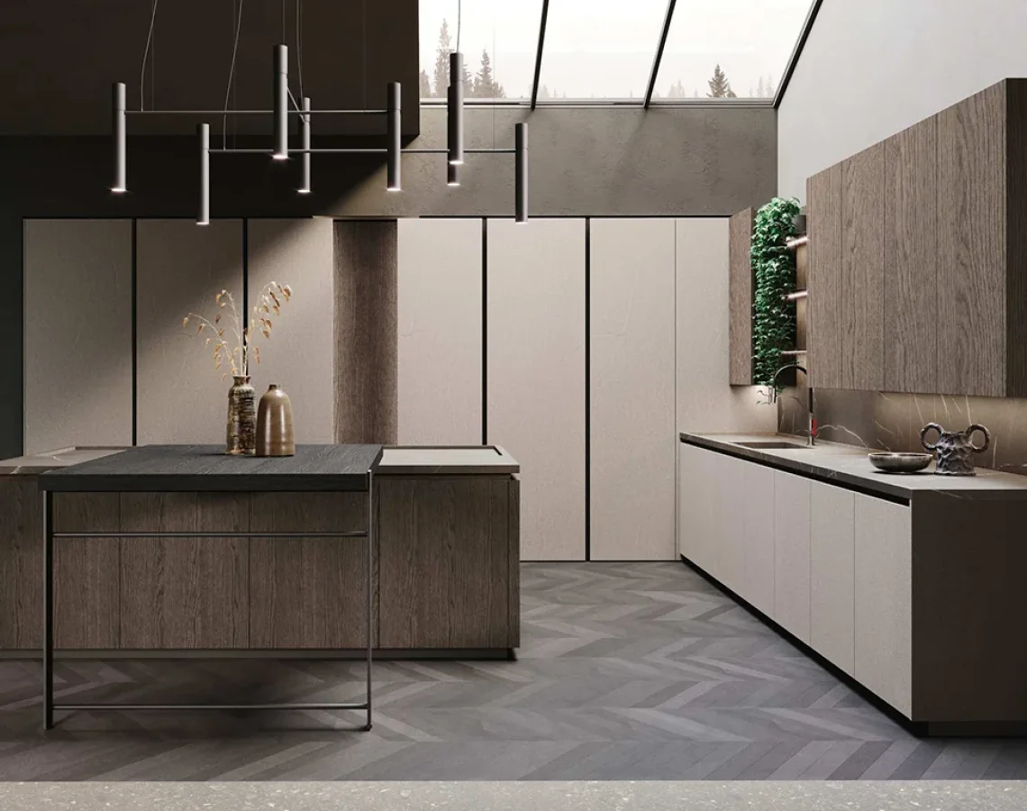 Cucina con moduli Bluna in legno e colonne bianche